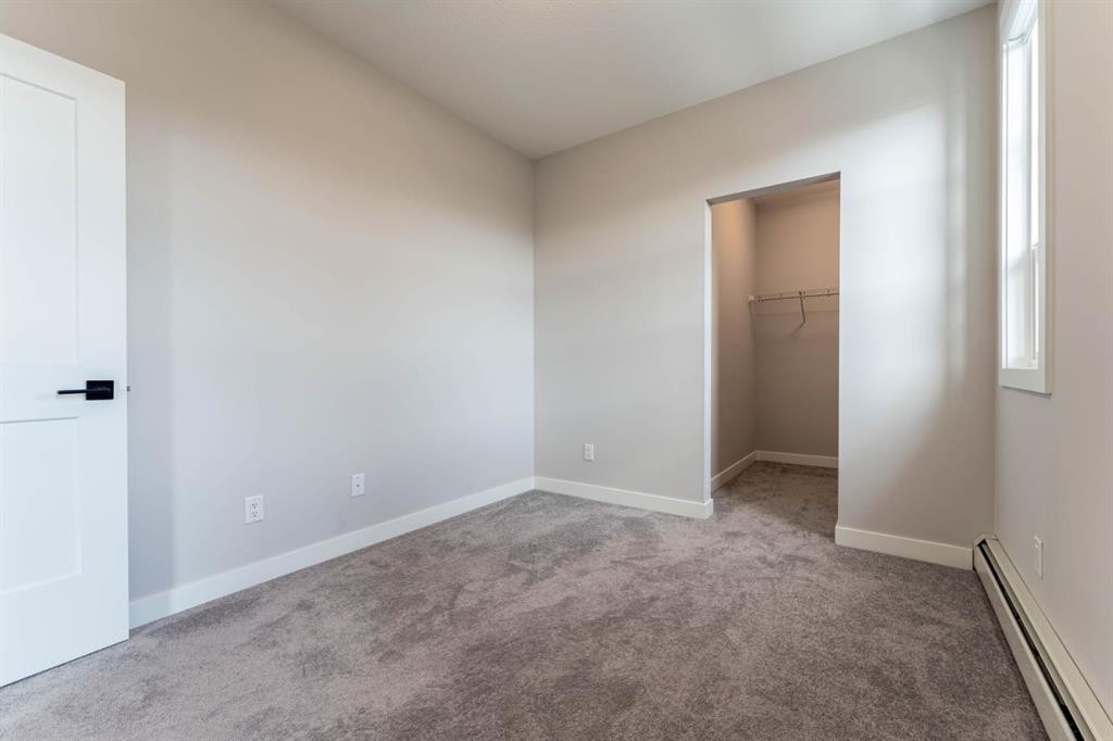 2312-55 Lucas Way Nw, Calgary, AB - Indoor Photo Showing Other Room