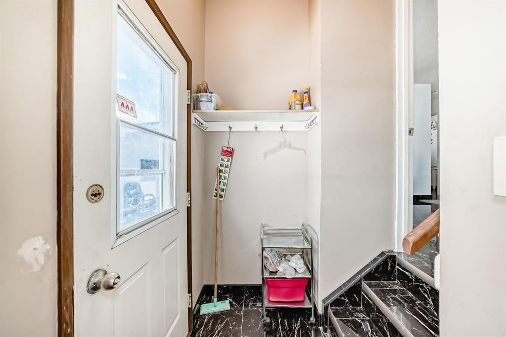 19 Malvern Place Ne, Calgary, AB - Indoor Photo Showing Other Room