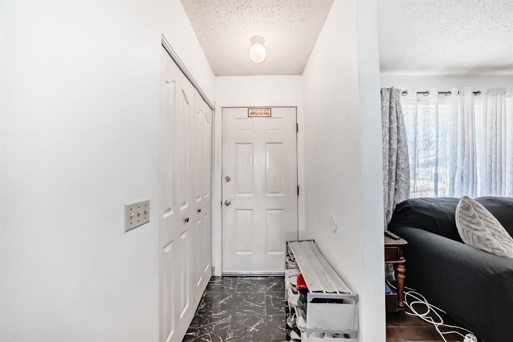 19 Malvern Place Ne, Calgary, AB - Indoor Photo Showing Other Room