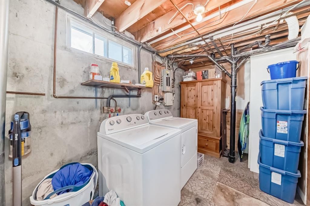 19 Malvern Place Ne, Calgary, AB - Indoor Photo Showing Laundry Room