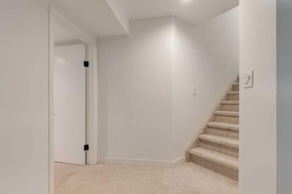 113 Straddock Terrace Sw, Calgary, AB - Indoor Photo Showing Other Room