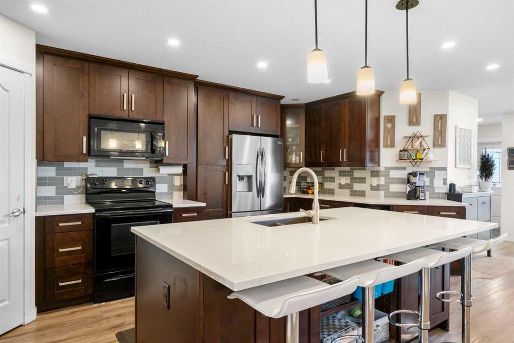 17 Cranford Place Se, Calgary, AB - Indoor Photo Showing Kitchen With Upgraded Kitchen