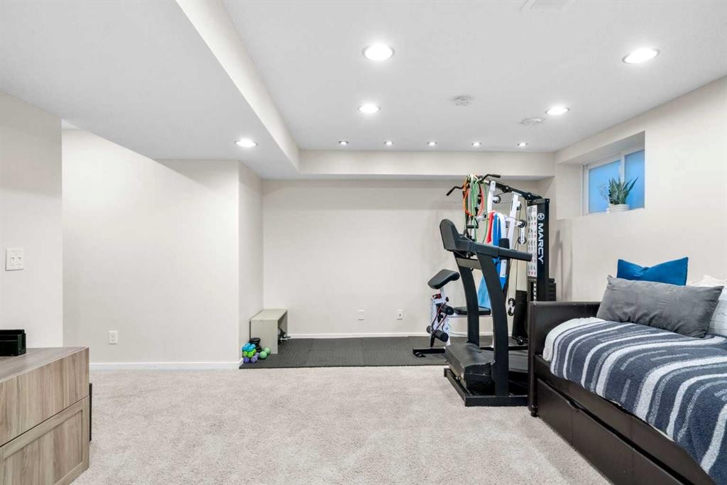 17 Cranford Place Se, Calgary, AB - Indoor Photo Showing Gym Room