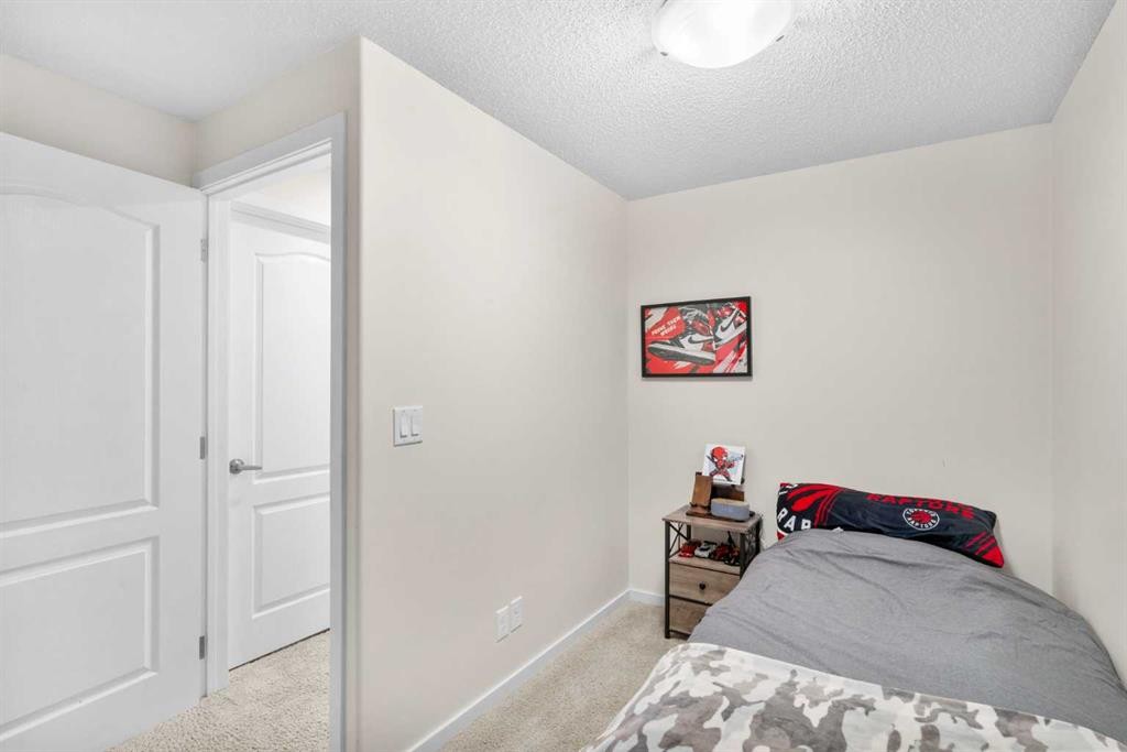 17 Cranford Place Se, Calgary, AB - Indoor Photo Showing Bedroom