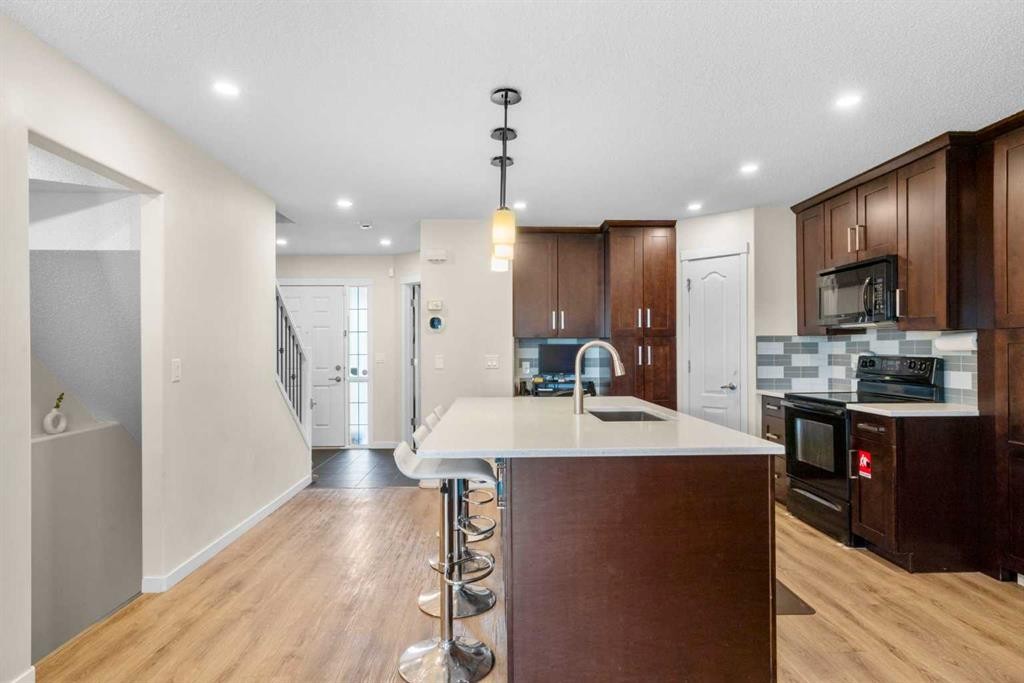 17 Cranford Place Se, Calgary, AB - Indoor Photo Showing Kitchen With Upgraded Kitchen