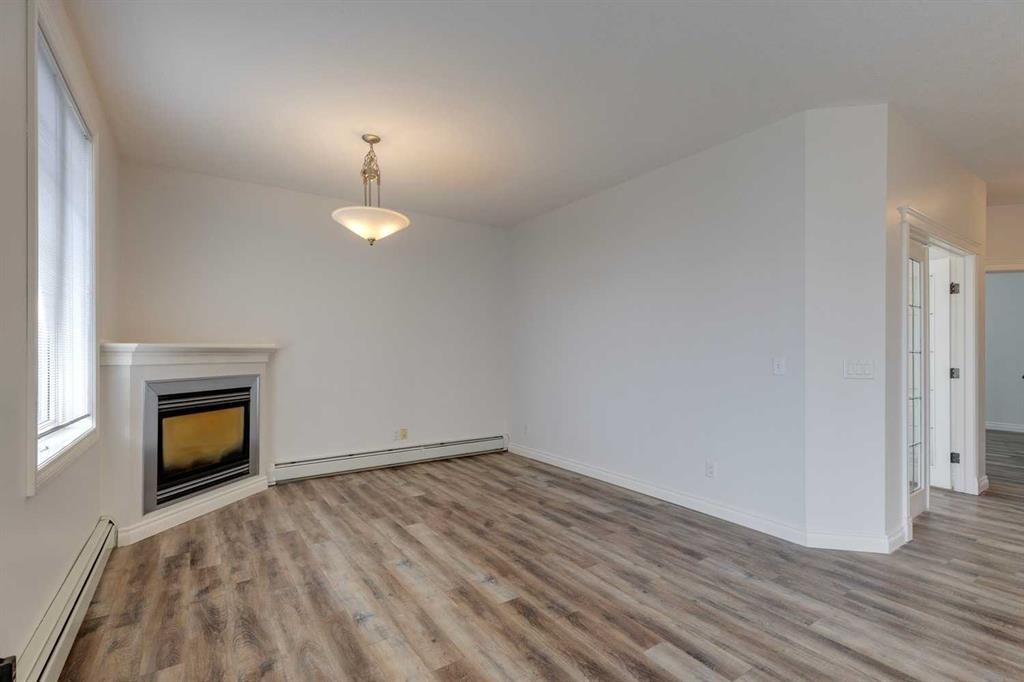 304-1606 4 Street Nw, Calgary, AB - Indoor With Fireplace
