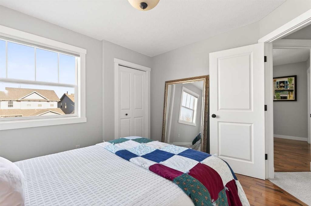 4 Cougarstone Square Sw, Calgary, AB - Indoor Photo Showing Bedroom