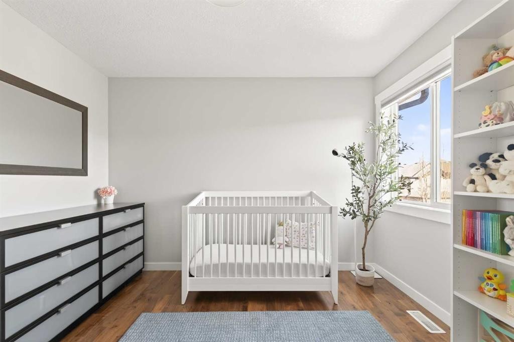 4 Cougarstone Square Sw, Calgary, AB - Indoor Photo Showing Bedroom