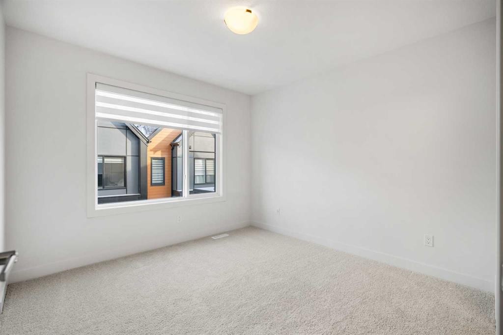 202-550 Seton Circle Se, Calgary, AB - Indoor Photo Showing Other Room