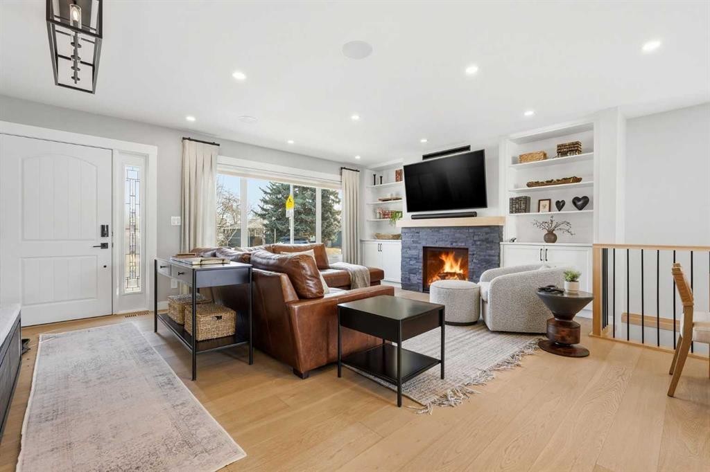 8615 7 Street Sw, Calgary, AB - Indoor Photo Showing Other Room With Fireplace