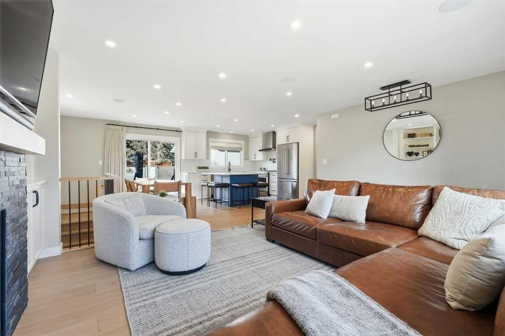 8615 7 Street Sw, Calgary, AB - Indoor Photo Showing Living Room With Fireplace
