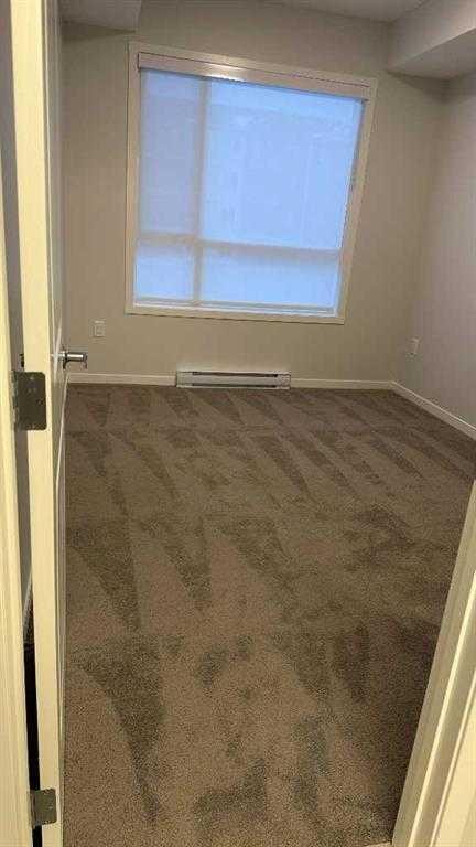3210-33 Carringham Gate Nw, Calgary, AB - Indoor Photo Showing Other Room