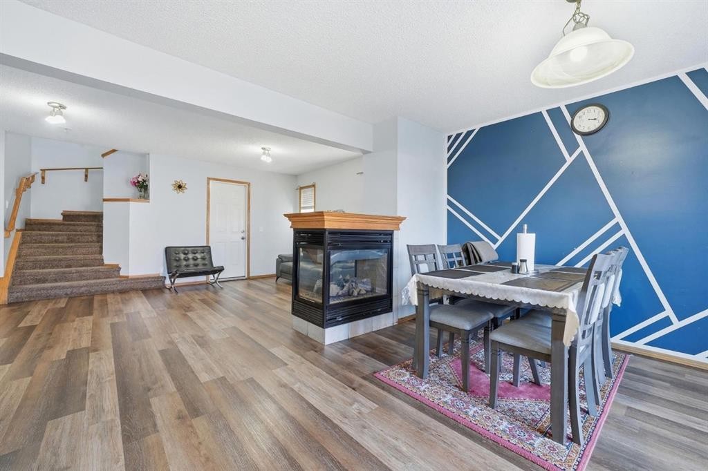 218 Tarawood Place Ne, Calgary, AB - Indoor With Fireplace