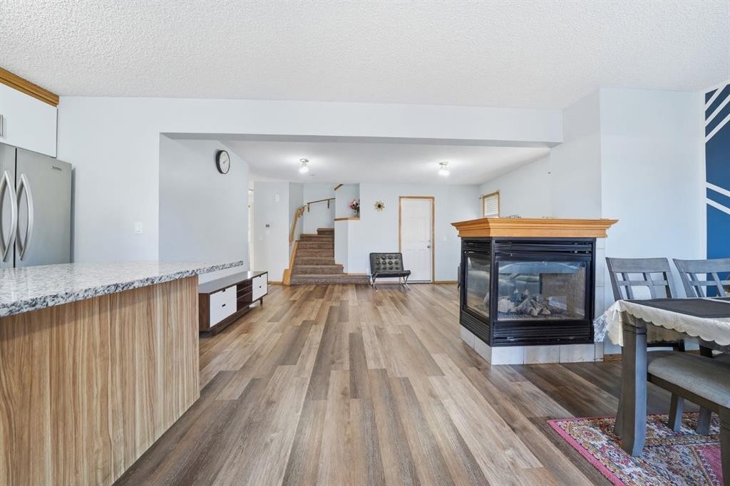 218 Tarawood Place Ne, Calgary, AB - Indoor With Fireplace