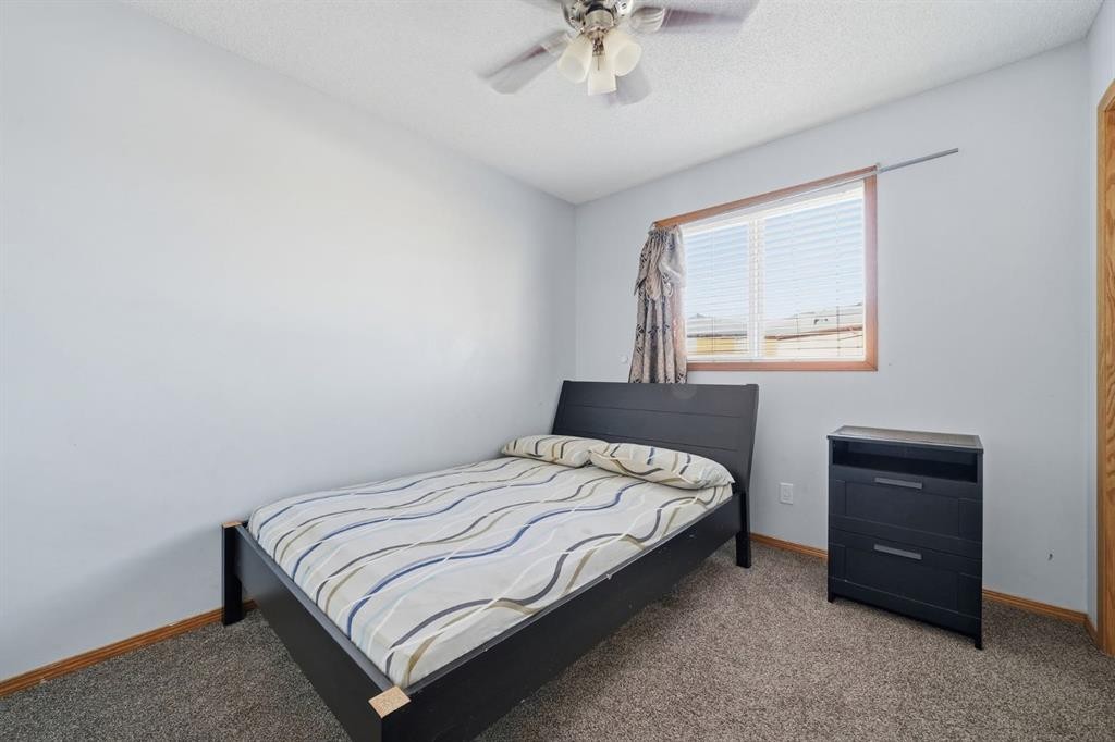 218 Tarawood Place Ne, Calgary, AB - Indoor Photo Showing Bedroom