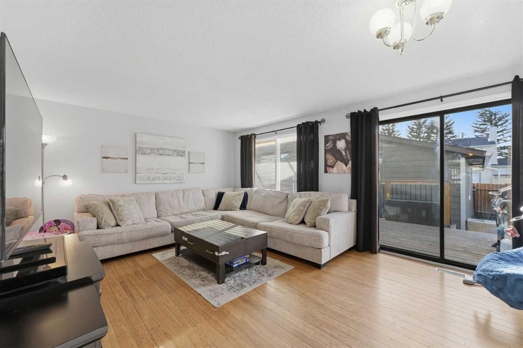 96 Abberfield Crescent Ne, Calgary, AB - Indoor Photo Showing Living Room
