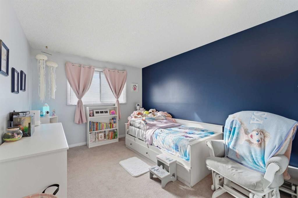 96 Abberfield Crescent Ne, Calgary, AB - Indoor Photo Showing Bedroom
