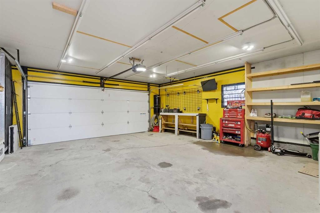 96 Abberfield Crescent Ne, Calgary, AB - Indoor Photo Showing Garage