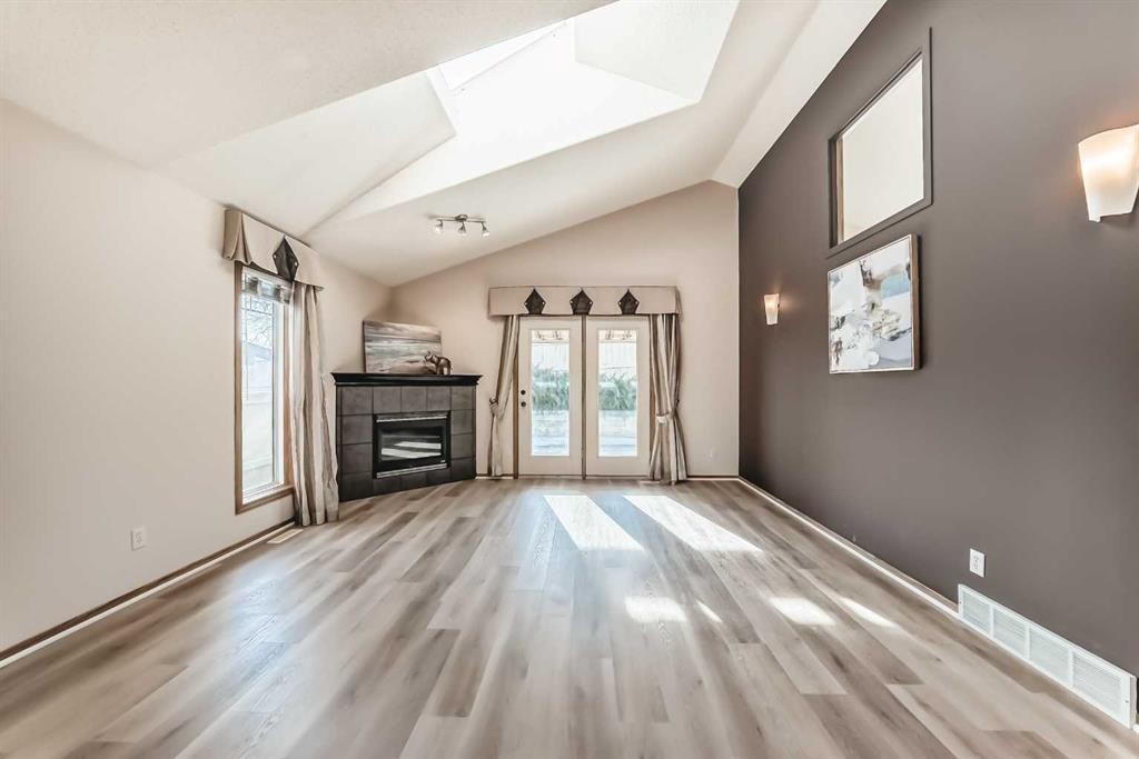 110 Somerglen Road Sw, Calgary, AB - Indoor With Fireplace