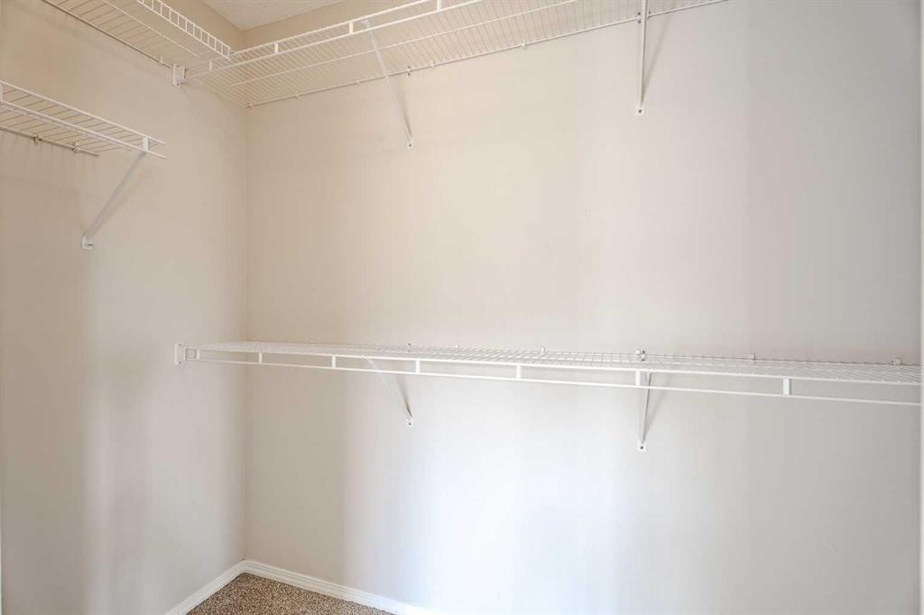 122 Panamount Drive Nw, Calgary, AB - Indoor With Storage