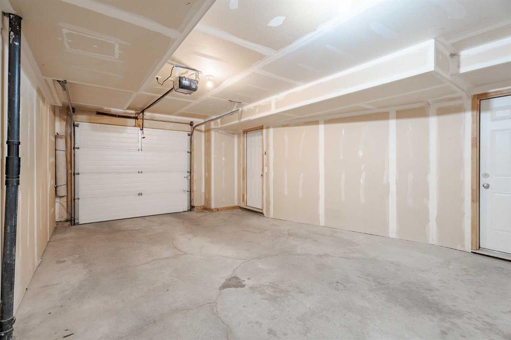 122 Panamount Drive Nw, Calgary, AB - Indoor Photo Showing Garage