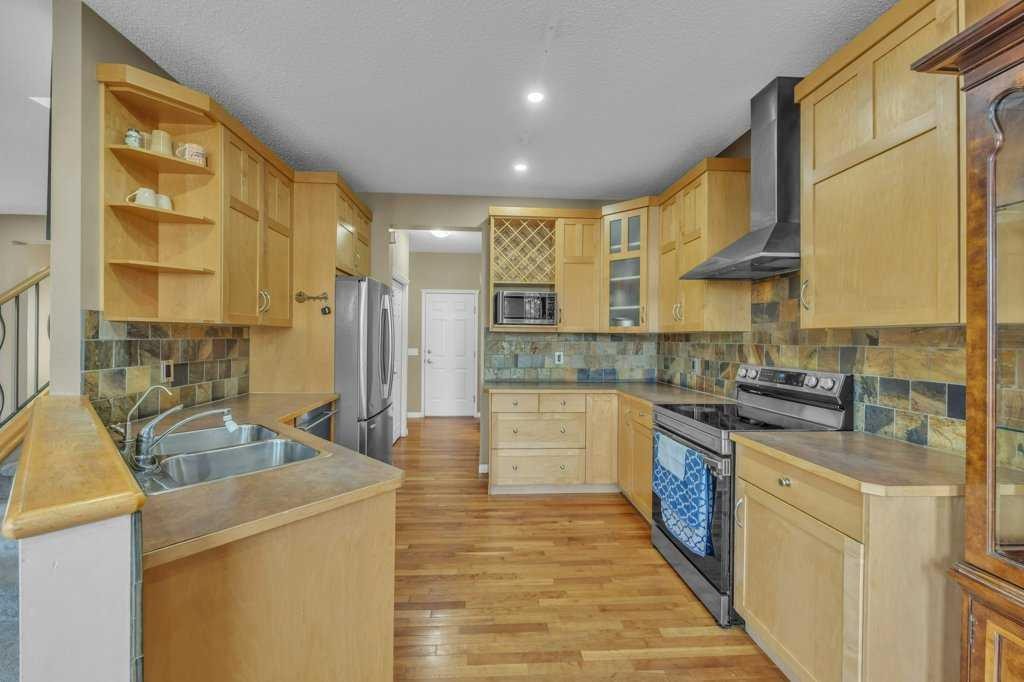 550 Copperfield Boulevard Se, Calgary, AB - Indoor Photo Showing Kitchen With Stainless Steel Kitchen With Double Sink