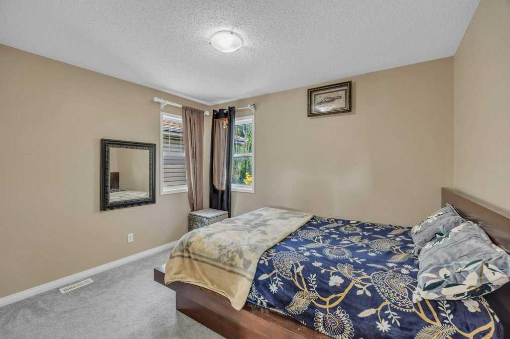 550 Copperfield Boulevard Se, Calgary, AB - Indoor Photo Showing Bedroom