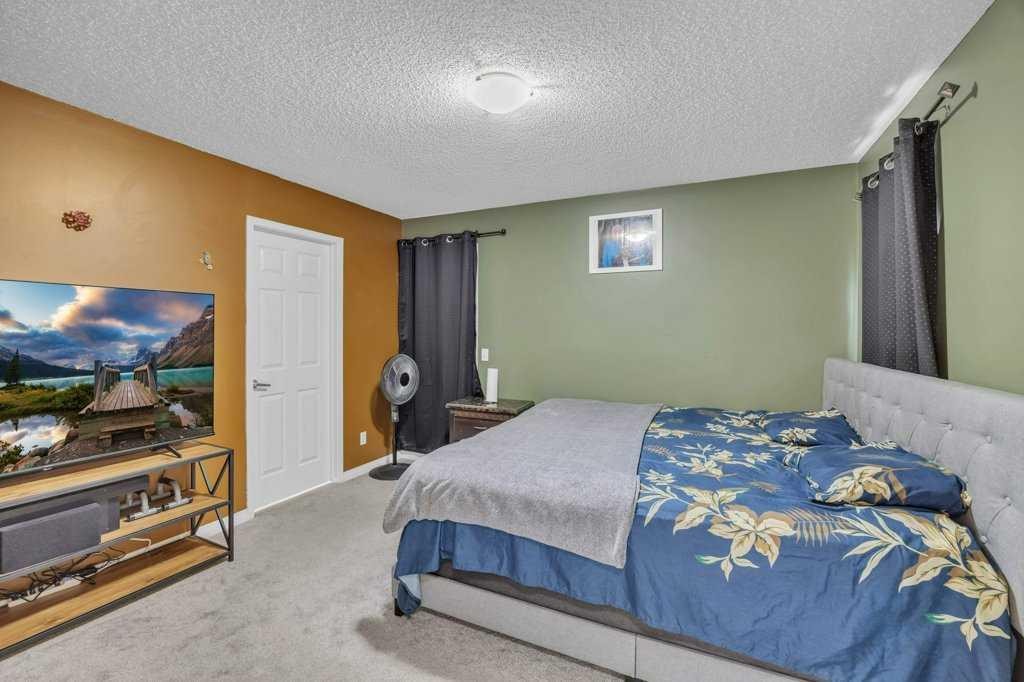 550 Copperfield Boulevard Se, Calgary, AB - Indoor Photo Showing Bedroom