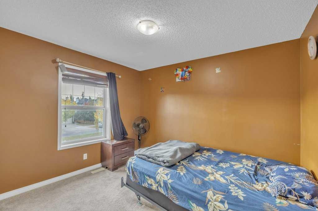 550 Copperfield Boulevard Se, Calgary, AB - Indoor Photo Showing Bedroom