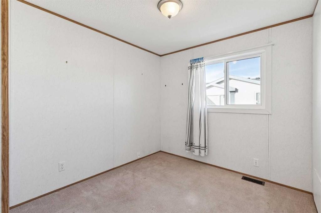 1909 29 Avenue, Nanton, AB - Indoor Photo Showing Other Room