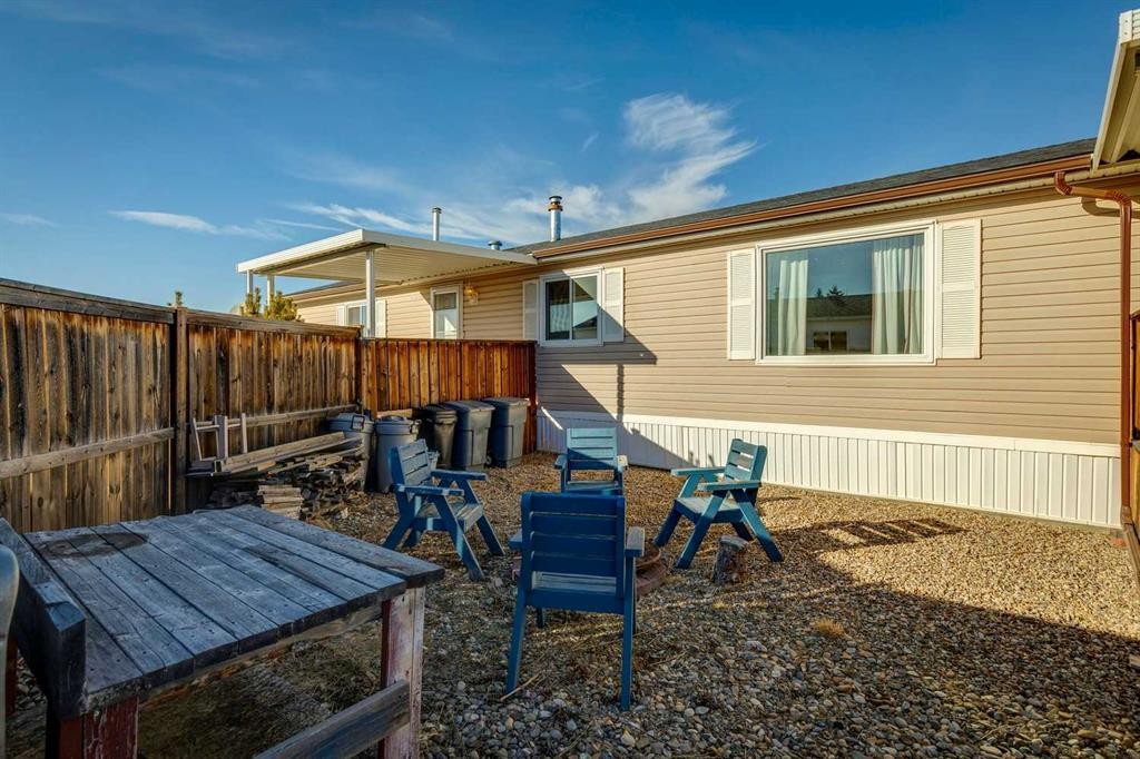 1909 29 Avenue, Nanton, AB - Outdoor With Deck Patio Veranda With Exterior
