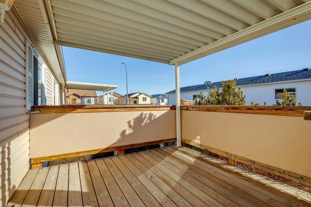 1909 29 Avenue, Nanton, AB - Outdoor With Deck Patio Veranda With Exterior