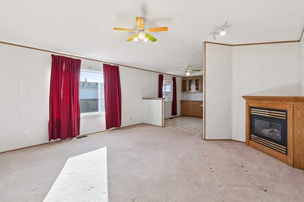 1909 29 Avenue, Nanton, AB - Indoor With Fireplace