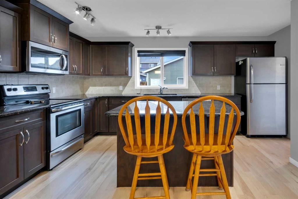 367 Fireside Place, Cochrane, AB - Indoor Photo Showing Kitchen With Stainless Steel Kitchen