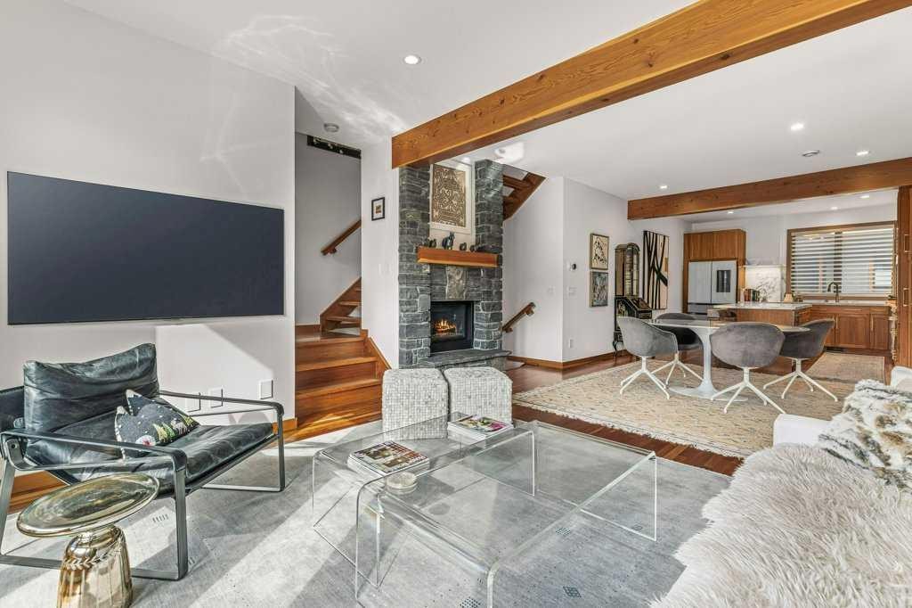 4-511 6Th Avenue, Canmore, AB - Indoor Photo Showing Living Room With Fireplace
