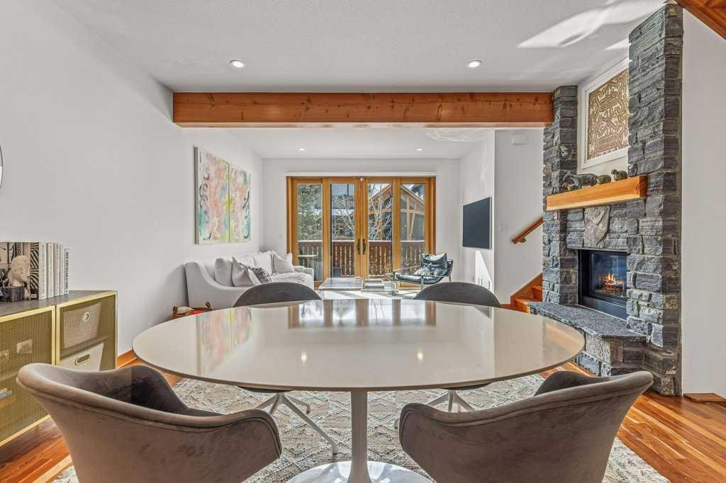 4-511 6Th Avenue, Canmore, AB - Indoor Photo Showing Living Room With Fireplace