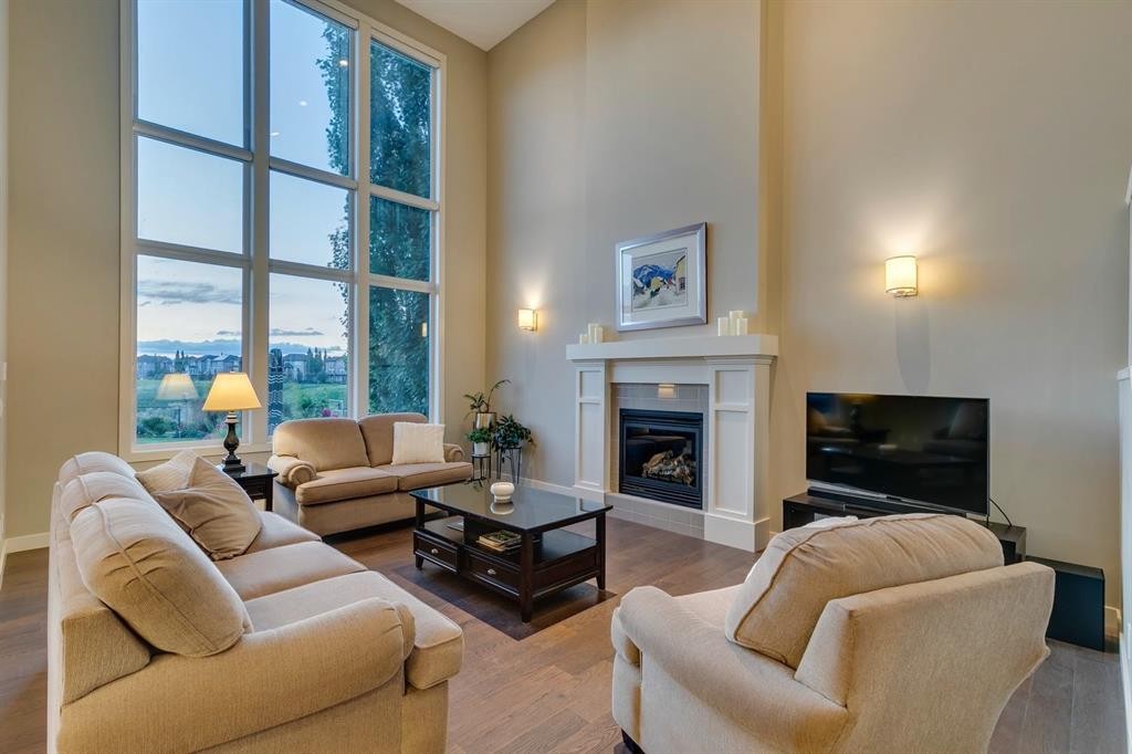 101 Cranarch Common Se, Calgary, AB - Indoor Photo Showing Living Room With Fireplace