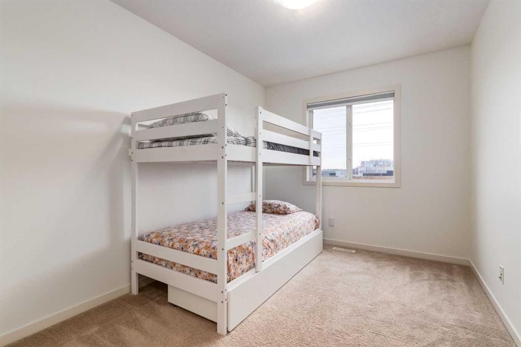 5 Cranford Place Se, Calgary, AB - Indoor Photo Showing Bedroom