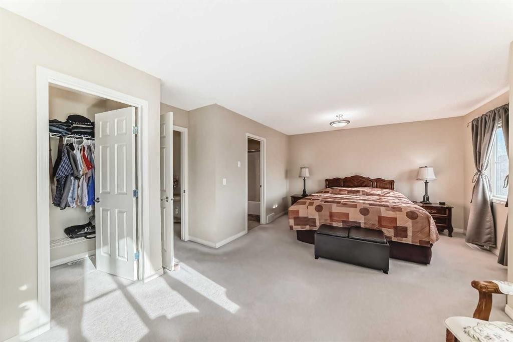 116 Hidden Creek Rise Nw, Calgary, AB - Indoor Photo Showing Bedroom