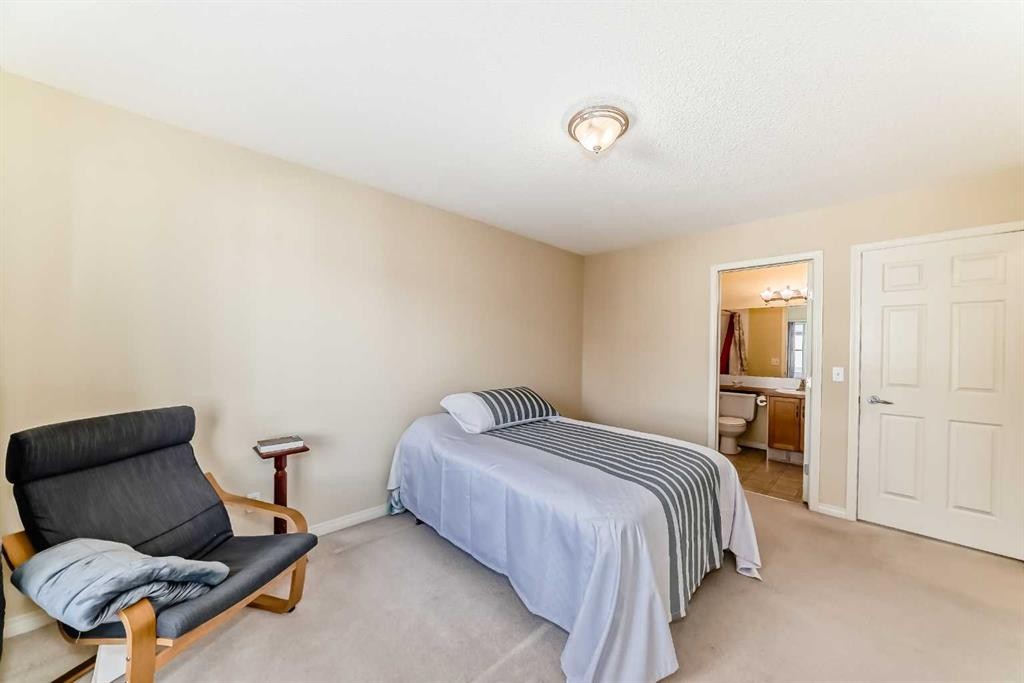 116 Hidden Creek Rise Nw, Calgary, AB - Indoor Photo Showing Bedroom