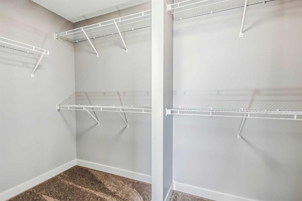 4 Topaz Place, Cochrane, AB - Indoor With Storage