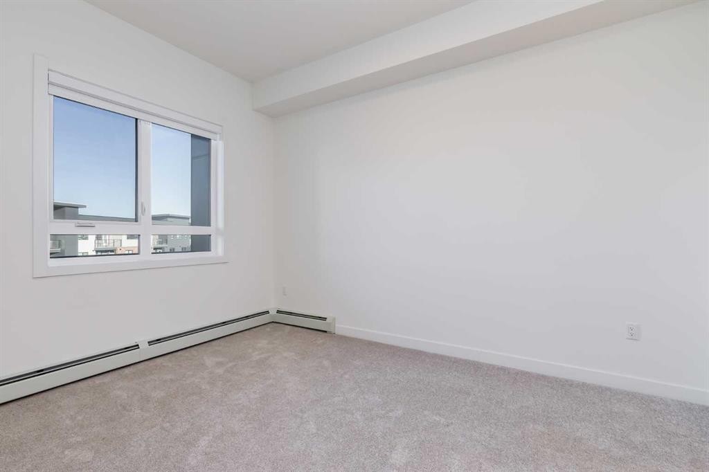 1414-520 Reynolds Avenue Sw, Airdrie, AB - Indoor Photo Showing Other Room