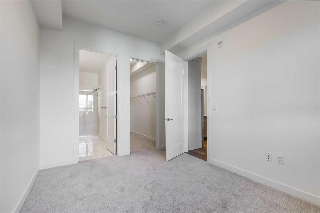 1414-520 Reynolds Avenue Sw, Airdrie, AB - Indoor Photo Showing Other Room
