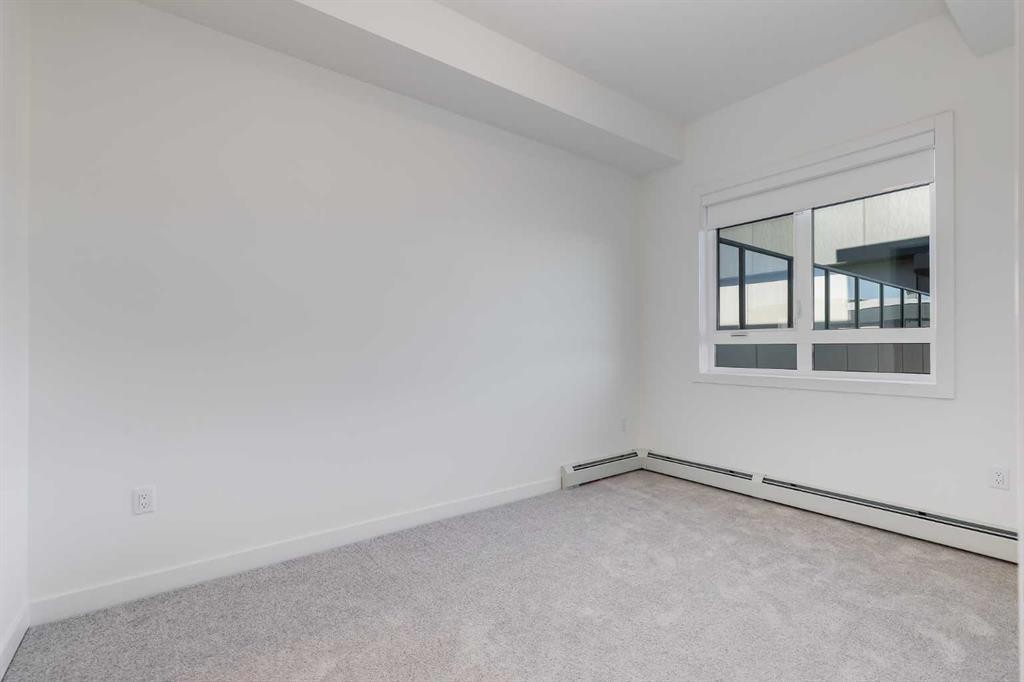 1414-520 Reynolds Avenue Sw, Airdrie, AB - Indoor Photo Showing Other Room