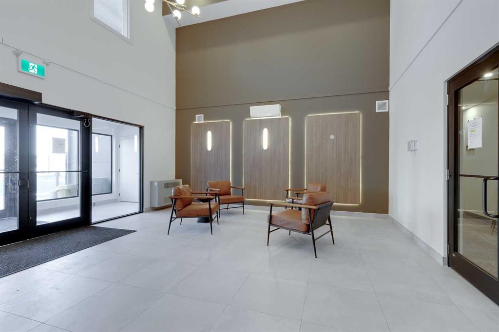 1414-520 Reynolds Avenue Sw, Airdrie, AB - Indoor Photo Showing Other Room