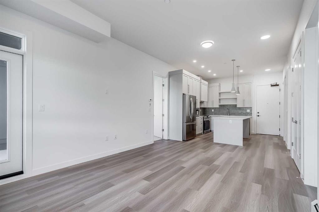 1414-520 Reynolds Avenue Sw, Airdrie, AB - Indoor Photo Showing Kitchen