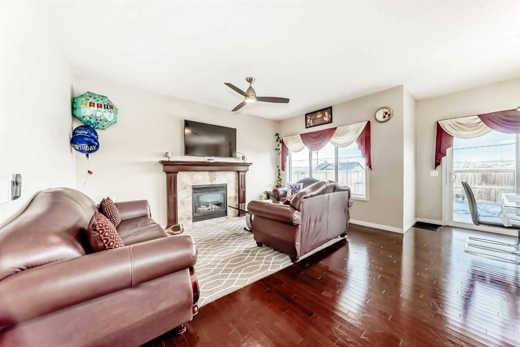 71 Martha'S Meadow Close Ne, Calgary, AB - Indoor Photo Showing Living Room With Fireplace