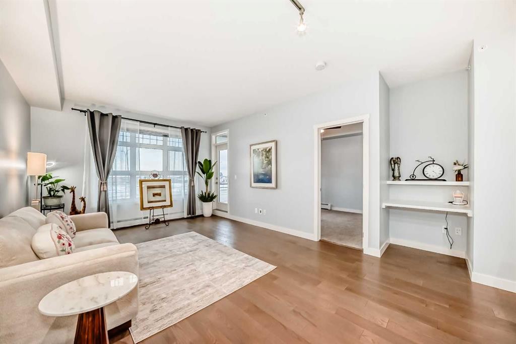 409-25 Auburn Meadows Avenue Se, Calgary, AB - Indoor Photo Showing Living Room