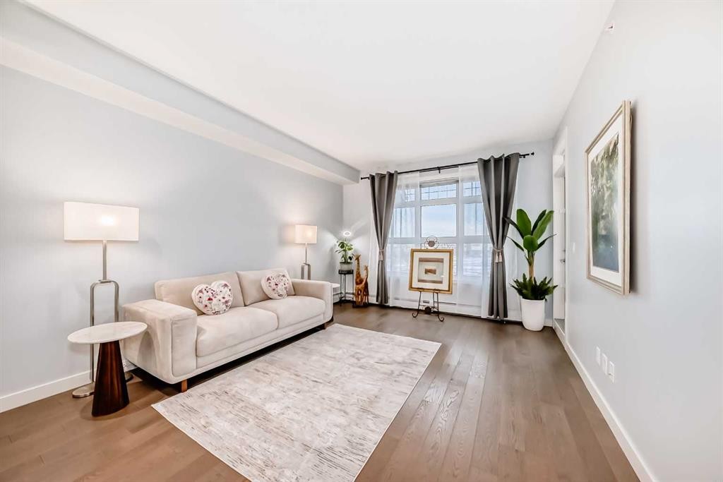 409-25 Auburn Meadows Avenue Se, Calgary, AB - Indoor Photo Showing Living Room