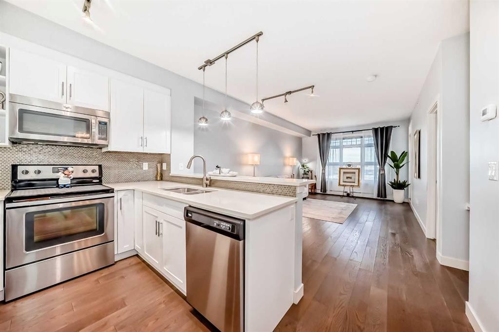 409-25 Auburn Meadows Avenue Se, Calgary, AB - Indoor Photo Showing Kitchen With Double Sink